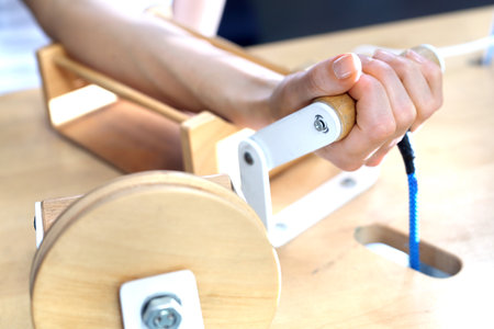 Rehabilitation of the hand. A woman is practicing a sick limb.の写真素材