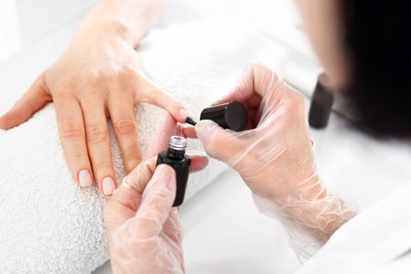 Nail painting in hands.の写真素材