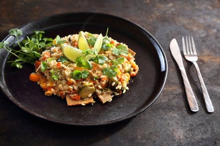 Vegetarian risotto. Stir-fry with lime and corianderの写真素材