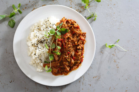 Vegetable goulash served with riceの写真素材