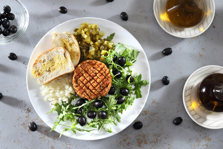 light snack. Vegetable snack served with olives and cucumber.の写真素材