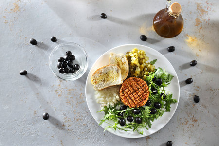 Vegetable diet. Vegetable snack served with olives and cucumber.の写真素材