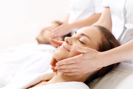 Ritual of beauty for couples. A woman in a spa salon.の写真素材