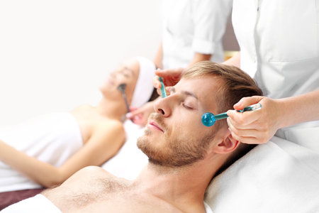 Wellness for lovers. A woman in a spa salon.の写真素材