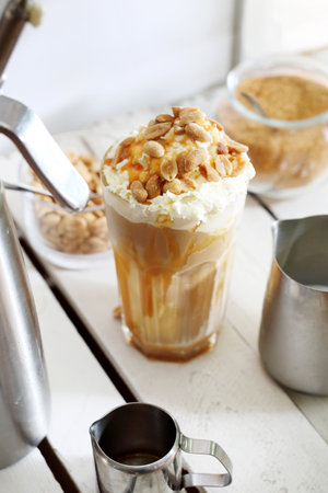 Sweet coffee dessert. Coffee with salty caramel and nuts.の写真素材