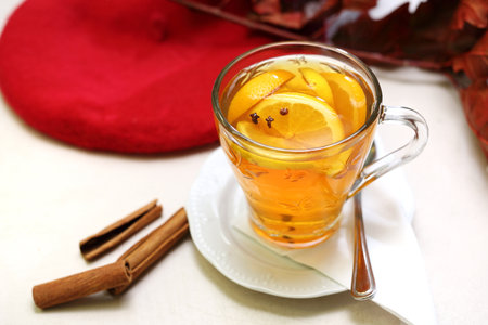 Warming tea with orange, cinnamon and cloves.の写真素材