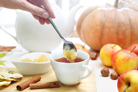 Warming autumn tea with apple jam.の写真素材