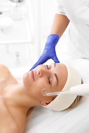Oxygen biofusion. A woman in a beauty salon during a care treatment using oxygenの写真素材