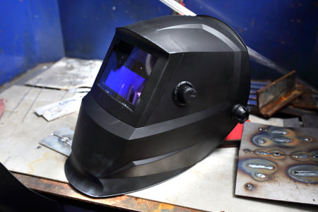 Welder's mask. Welder's helmet in a workshop, protection against radiation.の写真素材