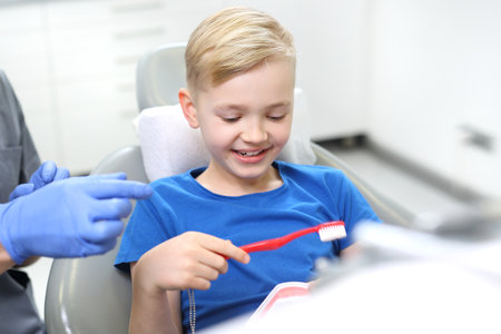 Teeth sealing, child at the dentistの写真素材