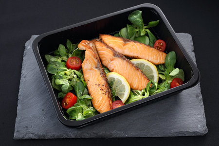 Ready take-away dish packed in a lunch boxの写真素材