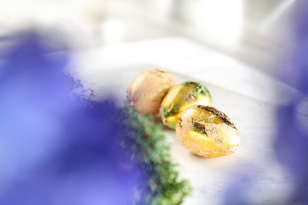 Easter composition with decorated eggs and shells.