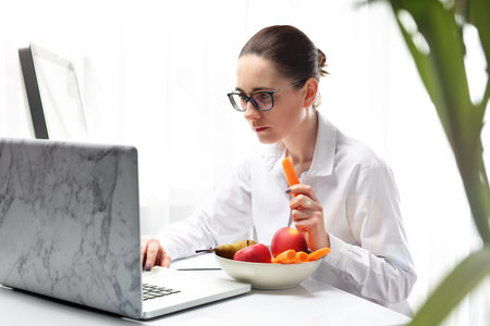 Healthy eating habits at work. Lunch in a corporation.の写真素材