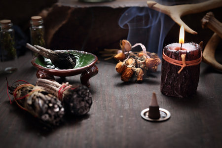 Fairy. Herbal incense and mysterious accessories on the table.の写真素材