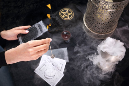 Tarot card. The fairy spreads the tarot cards, the magical meaning of the symbols.の写真素材