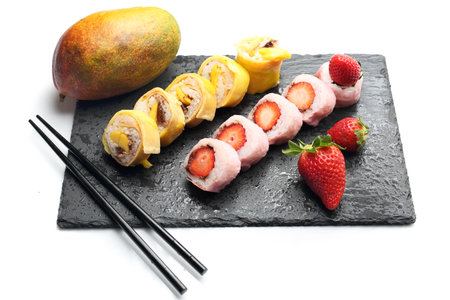 Fruit sushi, sushi roll with banana, sushi with strawberry and mango sushiの写真素材