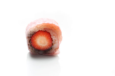 Fruit sushi, a sushi roll with strawberry and chocolate.の写真素材