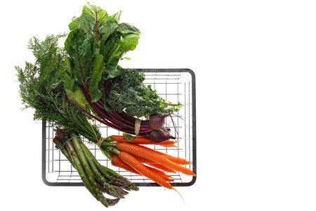 Fresh vegetables. Basket of vegetables from natural, organic cultivation. Composition on a white background, top viewの写真素材