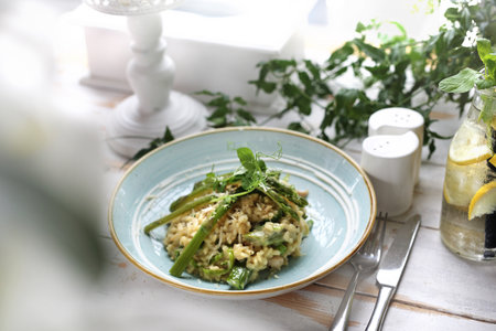 The dish served in the restaurant risotto with asparagus. Proposition of serving the dish.の写真素材