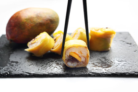 Tasty sweet sushi, fruit dessert. Horizontal compositionの写真素材