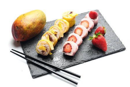 Tasty sweet sushi, fruit dessert. Horizontal compositionの写真素材