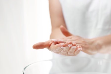 Hand spa. Hand skin care. The woman washes her hands.の写真素材