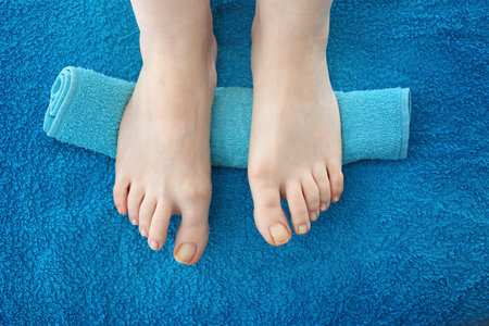 Female feet on a blueの写真素材