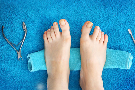 Female feet on a blueの写真素材