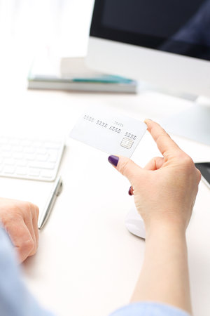 Card payment for online purchases. A woman buys in an online store.の写真素材