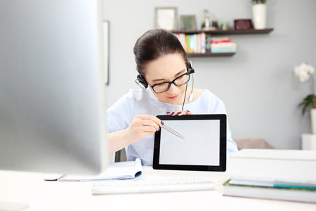 Online lessons. The teacher conducts the lesson online.の写真素材