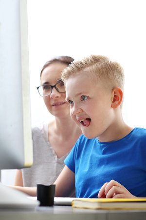 The child learns via the internet, online lesson.