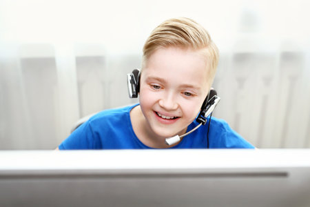 School on the web. Online lessons. The child learns via the internet, online lesson.の写真素材