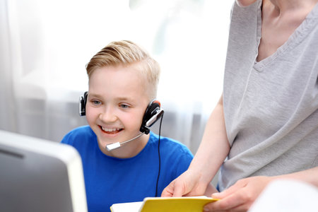 Online lesson.E-learning. The child learns via the internet, online lesson.の写真素材