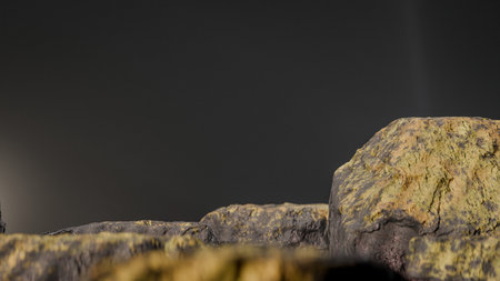 Close up of a rock on a dark background. 3D renderingの写真素材