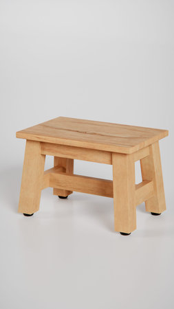 Wooden stool isolated on white background. Wooden stool with wooden legs.