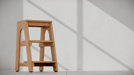 wooden stool on the floor with white wall and shadow from window