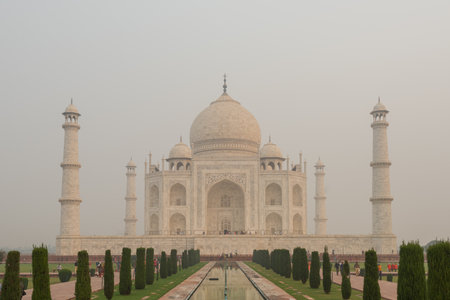 Front side of the Taj Mahal in Agra, India, on overcast morning with smogの写真素材