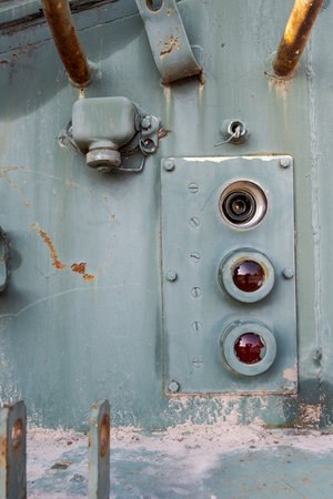 Detail of broken tail lights of soviet tank