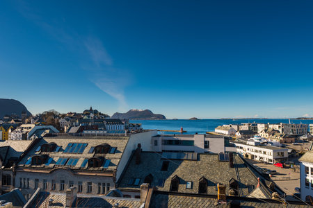 Scenic overview from high angle on the city of Ãlesund in Norway on sunny clear winter dayの写真素材