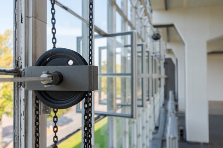 Chain pull for opening and closing big windows in the Bauhaus Dessauの写真素材