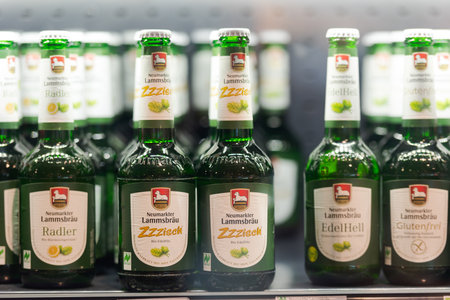 Regensburg, Germany - 2021 02 05: Refrigerated section with bottles of german brewery Neumarkter LammsbrÃ¤u craft beer behind glass doors on display in organic super marketのeditorial素材