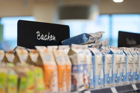 Regensburg, Germany - 2021 02 05: Sign over aisle in german organic supermarket with german word for bakingのeditorial素材