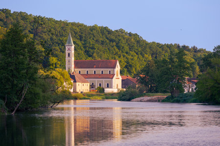 The church St. BartholomÃ¤us of the village Zeitlarn near Regensburg, Bavaria on the river Regen in afternoon sunlightの写真素材