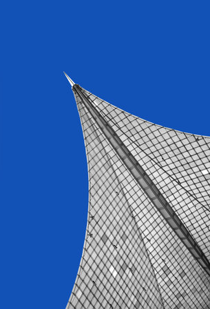 Detail of a modern, futuristic, pointed roof construction against blue sky. It is the top of the Konzertsegel in Radolfzell at the Lake Constance, Germany.のeditorial素材