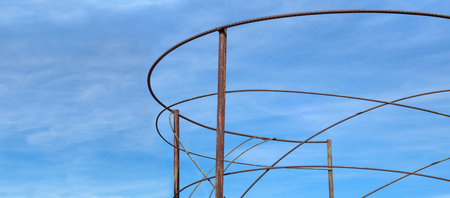 Abstract frame made of rusted, bent iron barsの写真素材