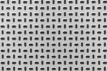 Gray metal plate with dark punched pattern