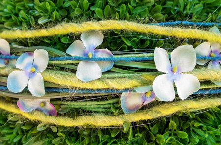 Decoration of fabric flowers and wool threadsの写真素材