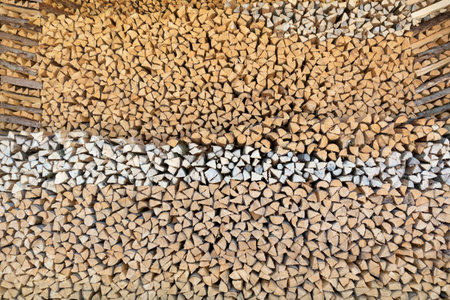 Hugh wood pile with many small pieces of wood
