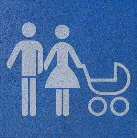 Sign father and mother with baby carriageの写真素材