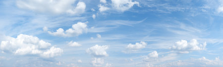 Light blue sky with beautiful romantic cloudscape - panorama